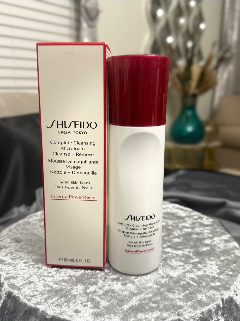 Shiseido White Bottle with Burgundy Cap Complete Cleansing Microfoam